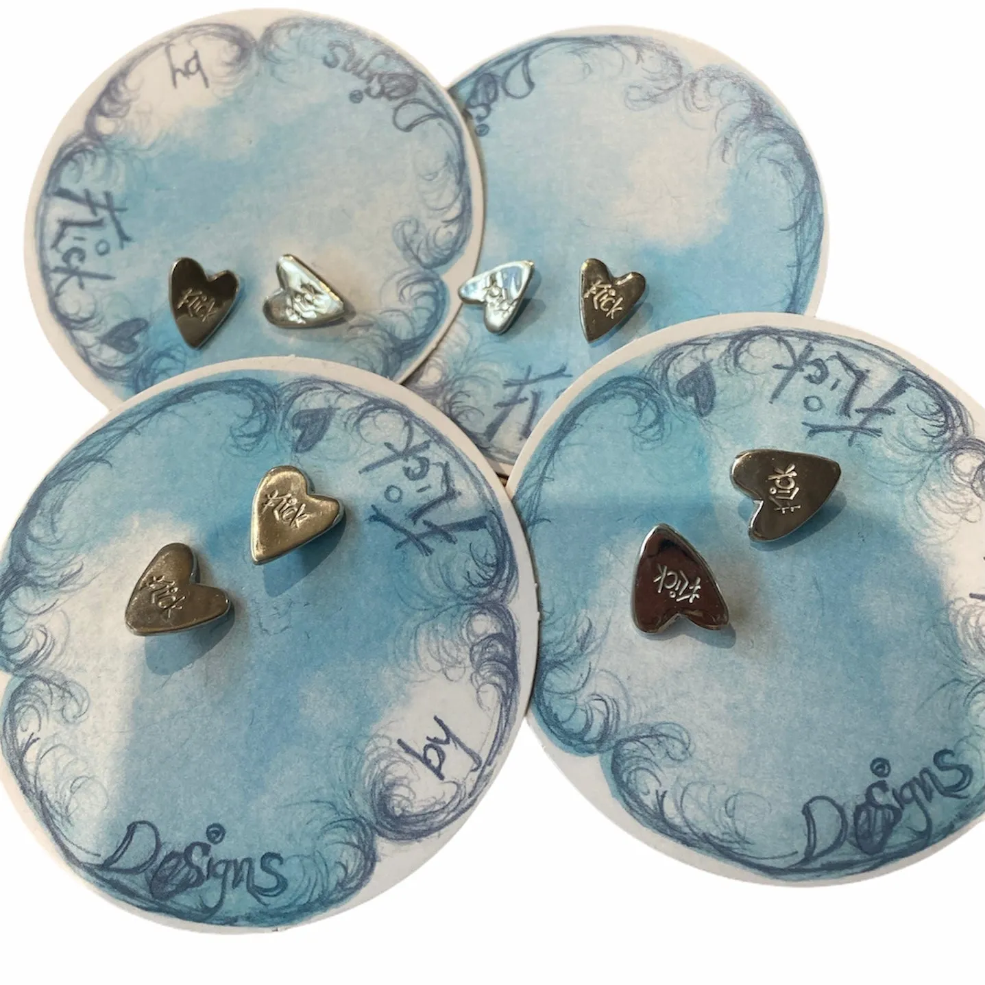 Silver heart studs